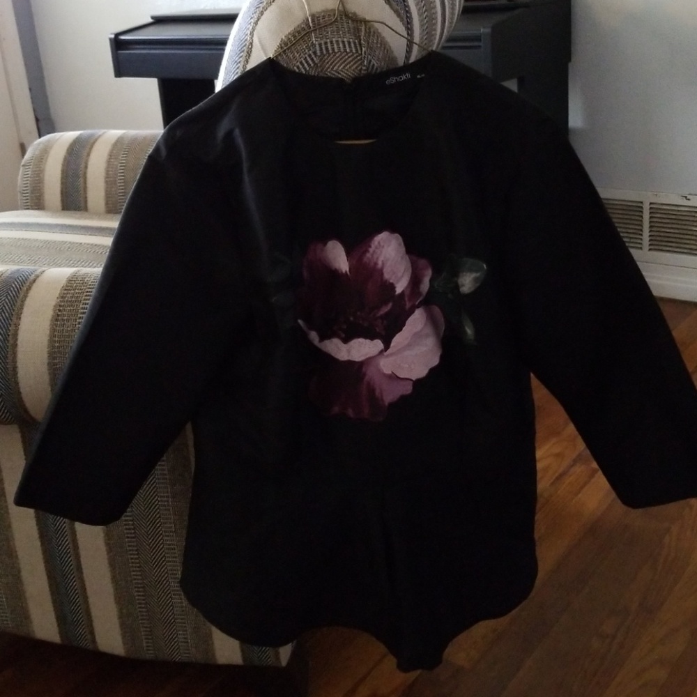 Black peplum flower blouse